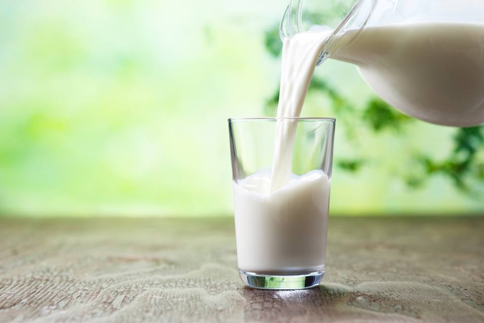 Pouring milk in the glass