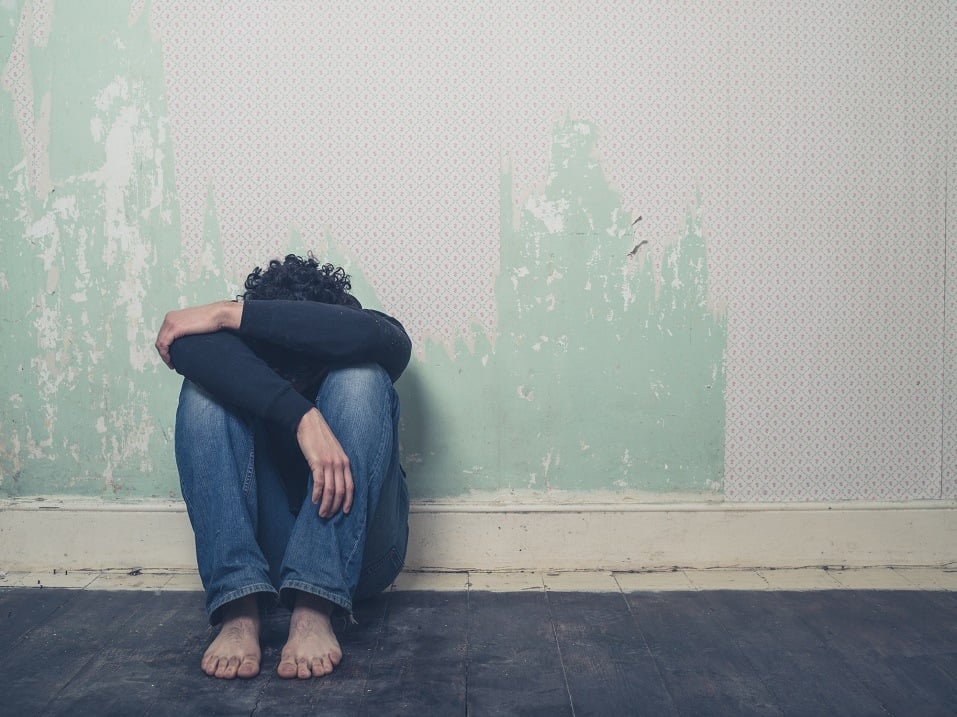 A sad and depressed young man