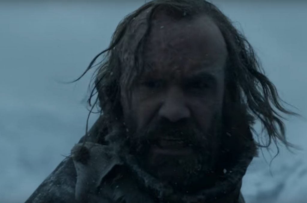 Sandor Clegane in the snow, turning to look over his right shoulder