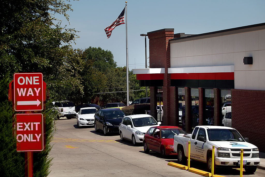 Drive through customers wait in line at a Chick-fil-A resturant