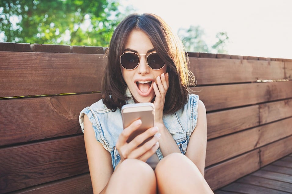 Young woman using smart phone
