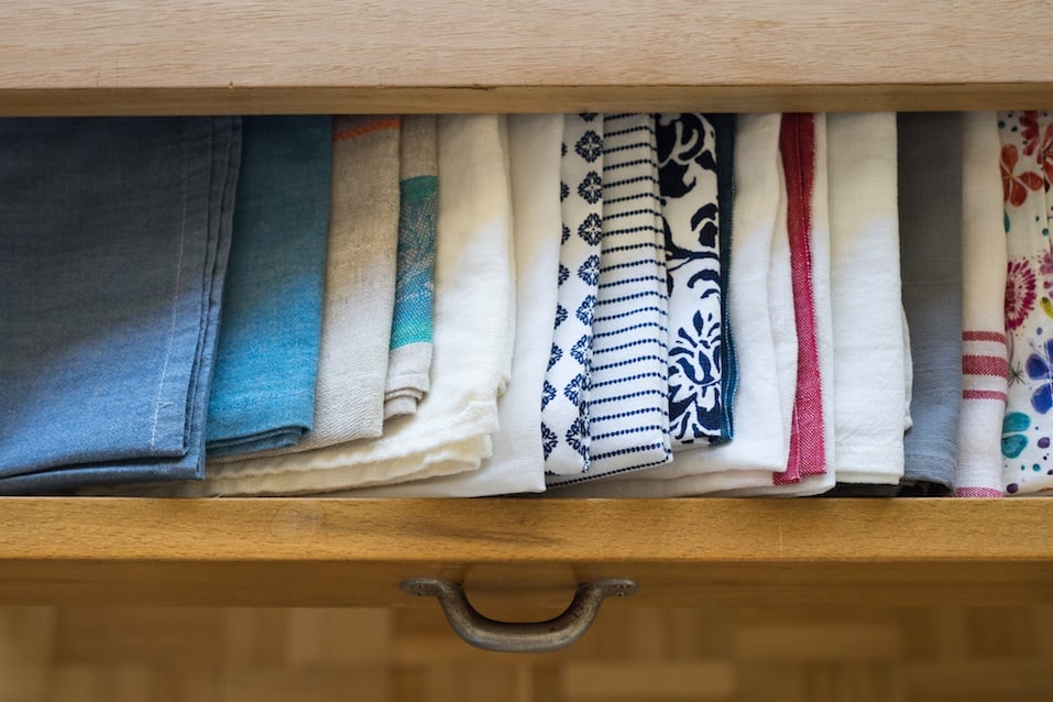 Tea towels arranged in a drawer