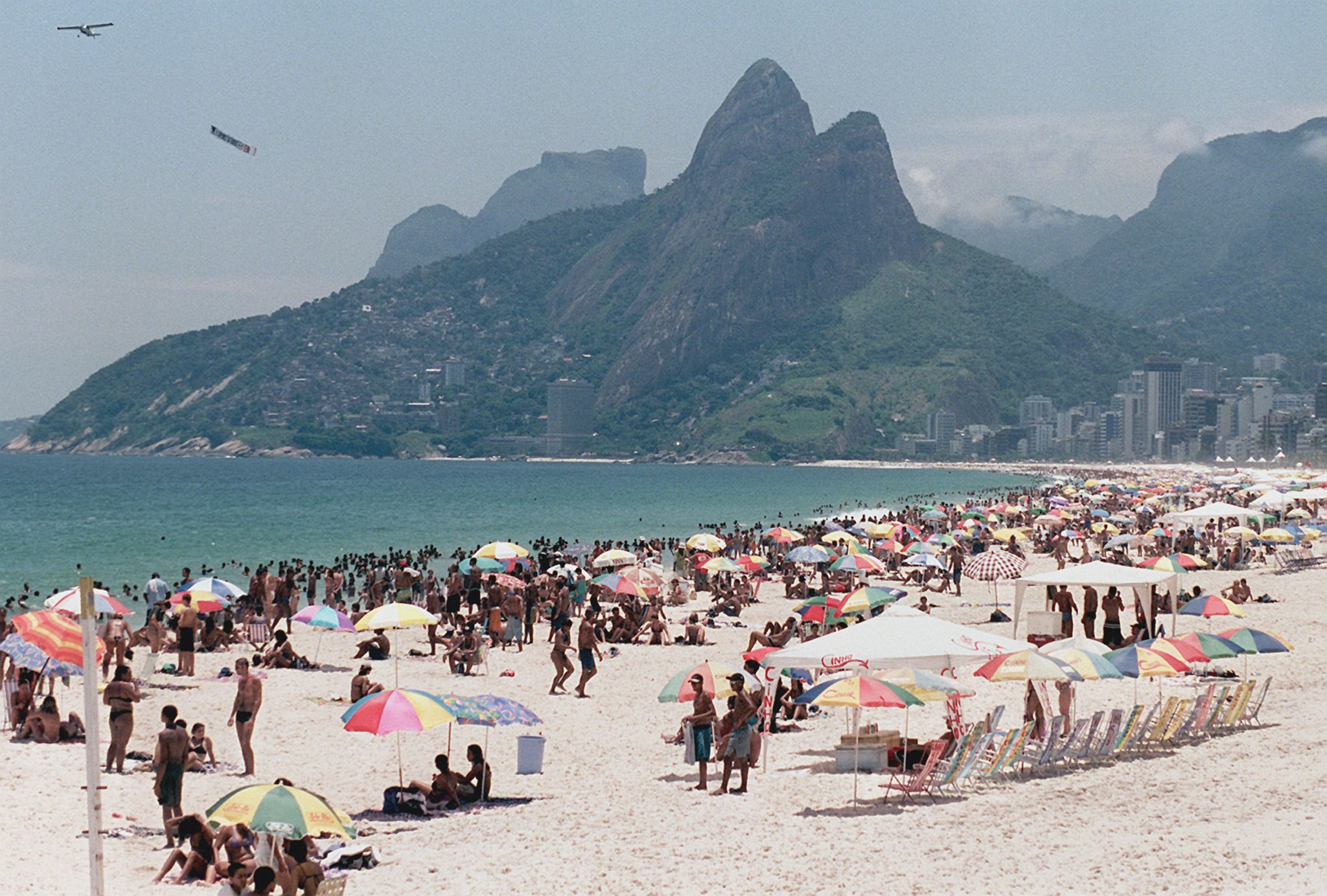 Beachgoers at Rio de Janeiro's Ipanema Beach take
