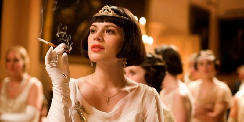 Hayley Atwell is in a dress and crown.