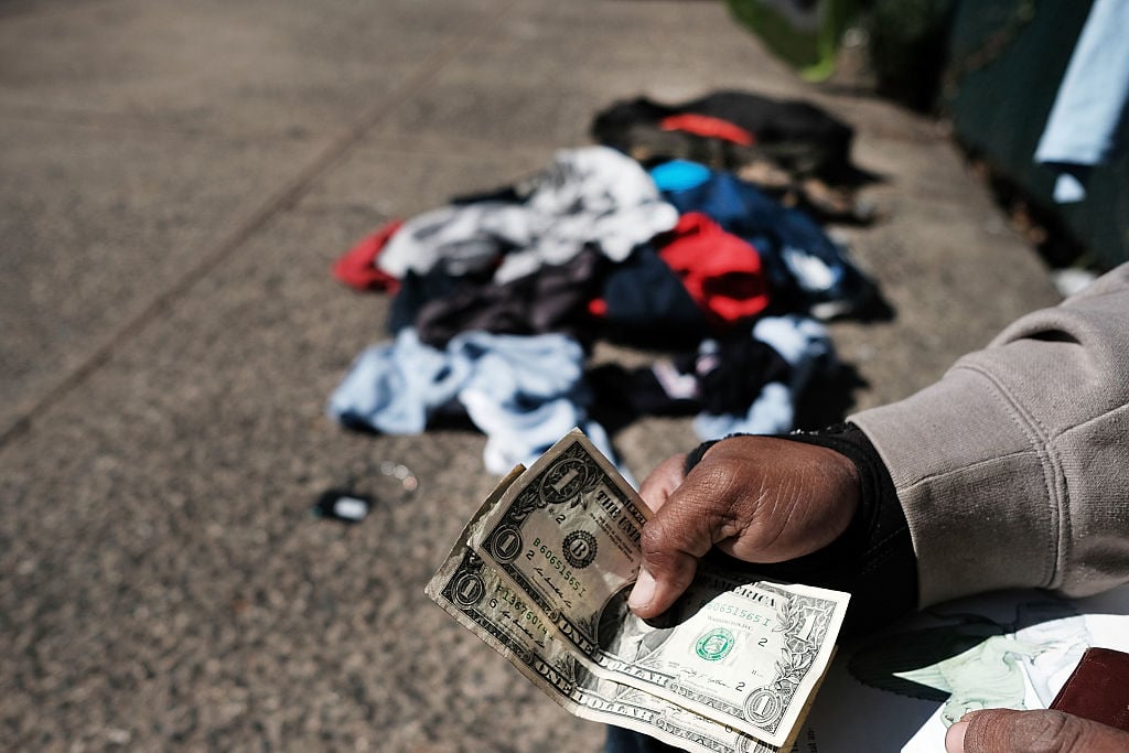 A man sells clothes on the street