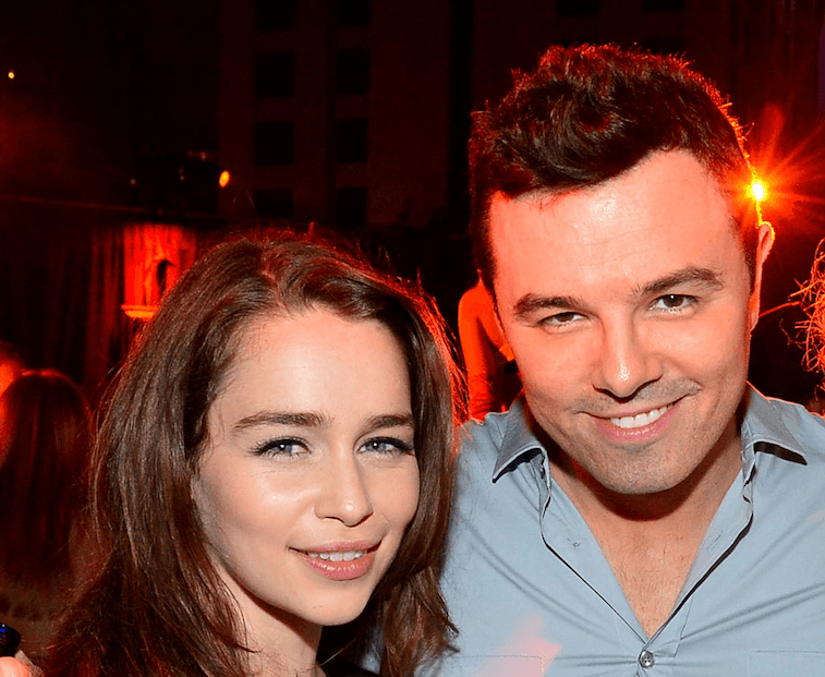 Emilia Clarke and Seth MacFarlane pose next to each other