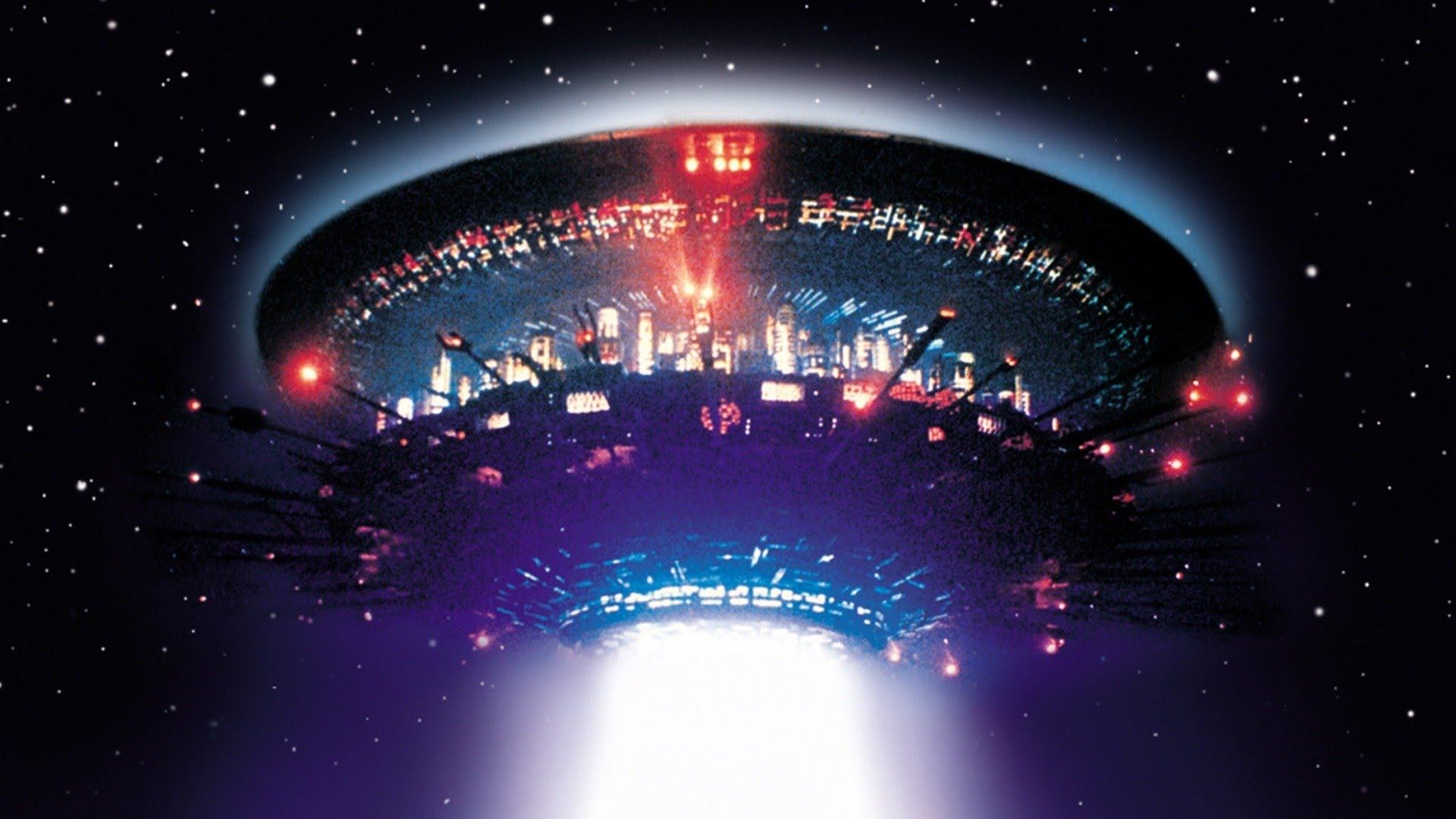 A spaceship, shaped like a tall circular stack, with lights surrounding it on all sides