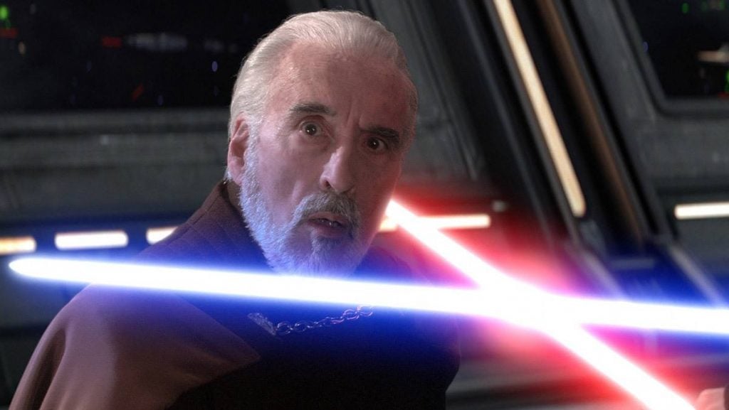 Count Dooku, with a blue and red lightsaber each pointed across his neck