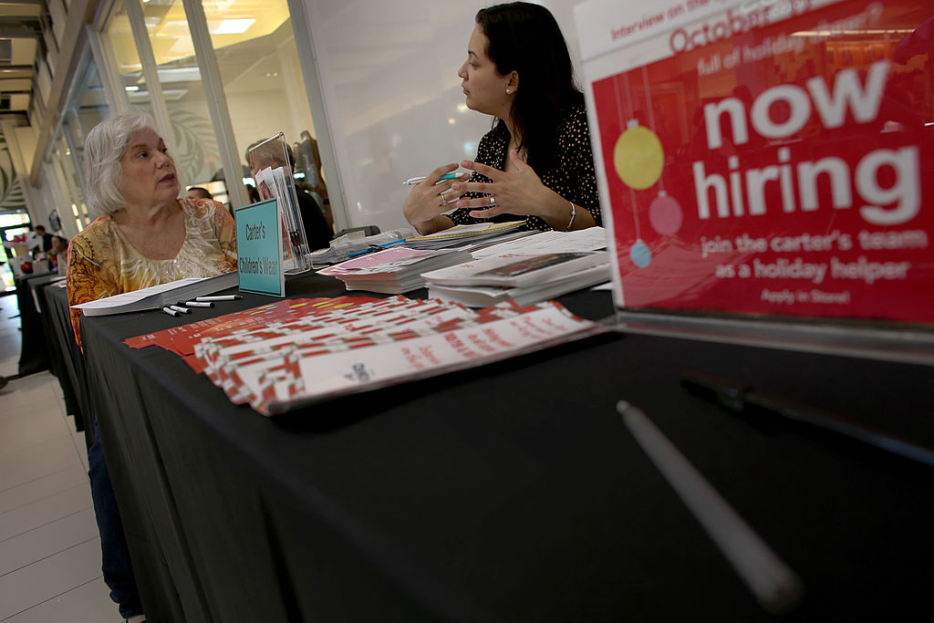 Two women engage in an interview.
