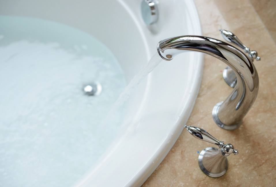 bath tub and faucet