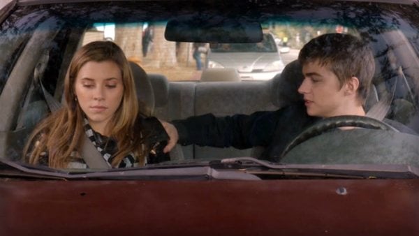 Amy and Miles sitting in a car