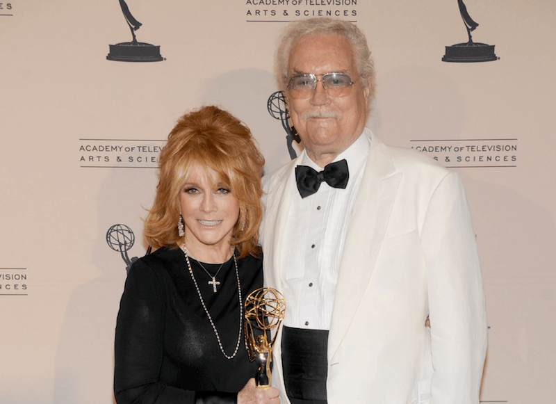 Roger Smith and wife Ann-Margret pose for cameras