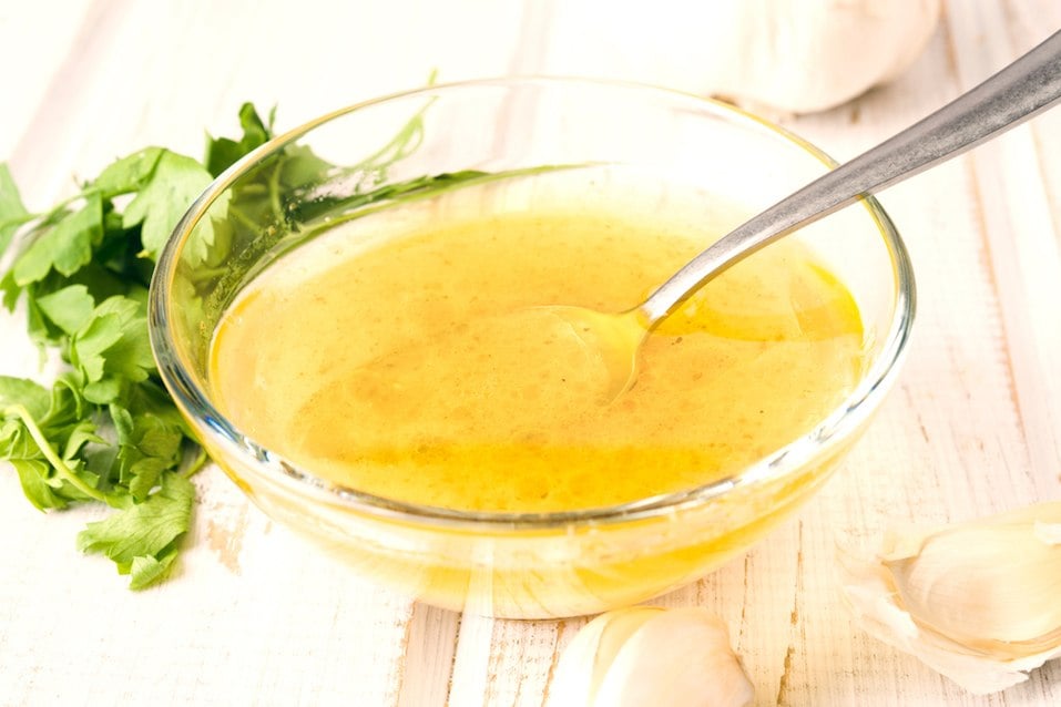 vinaigrette sauce in glass bowl