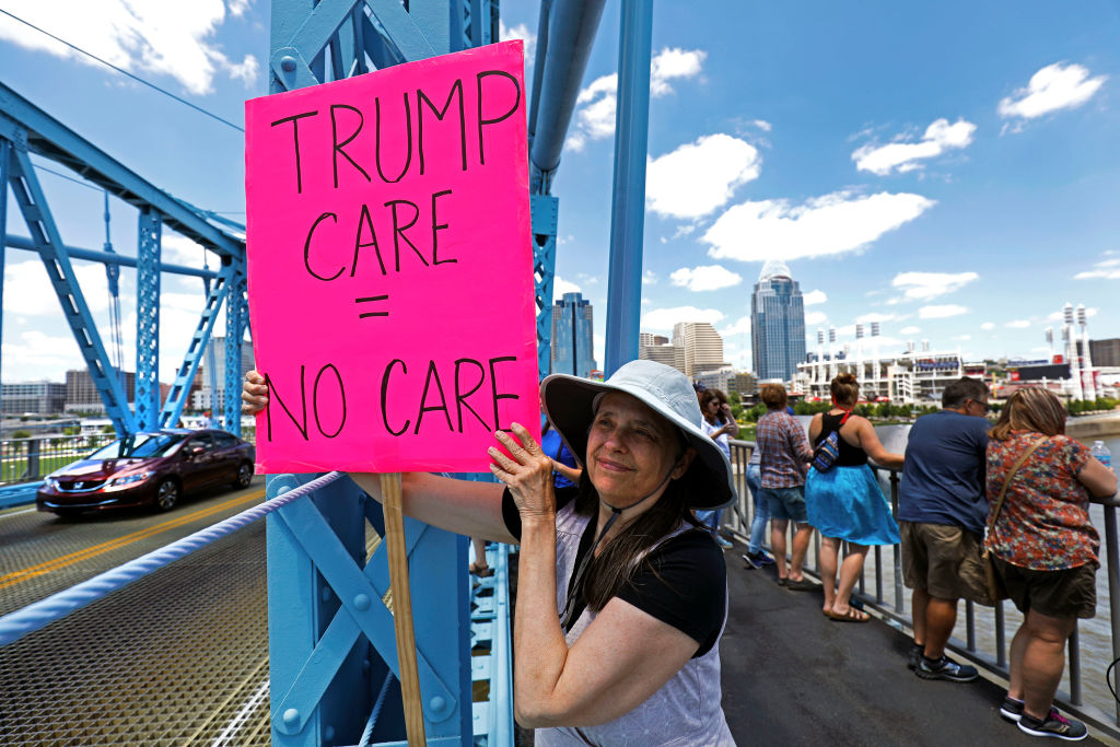 Protesters in Kentucky fight against the Affordable Care Act repeal, which would result in people losing health insurance coverage.