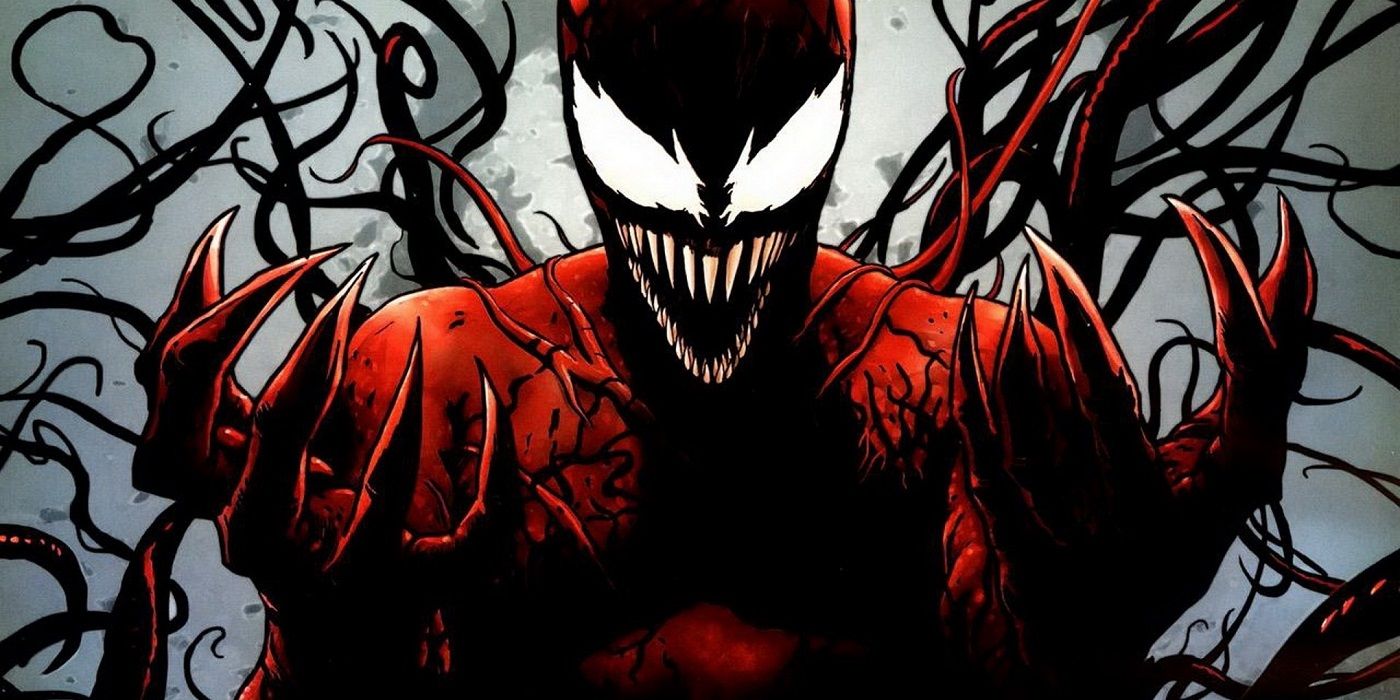 The villain Carnage holds up his hands in Marvel comics
