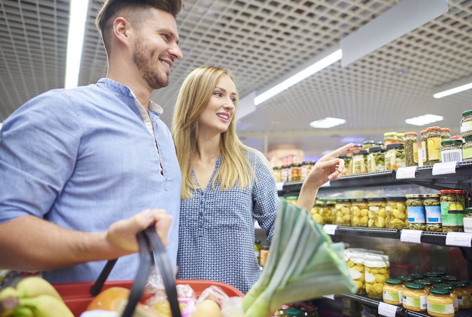 Couple shopping together in grocery store