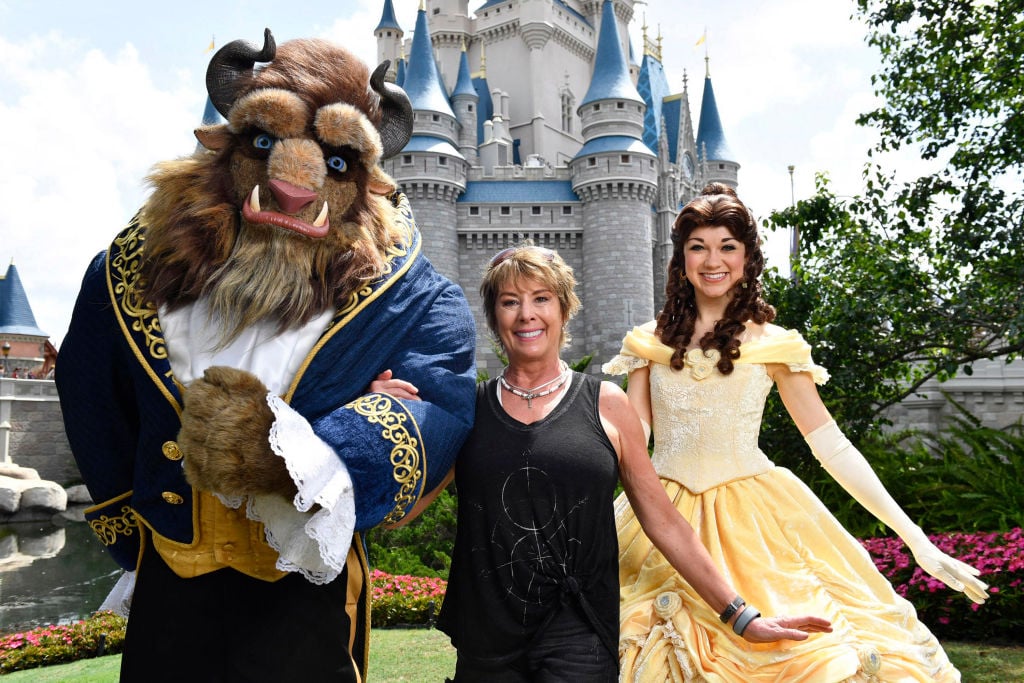 Paige O'Hara strikes a royal pose with Belle and Beast