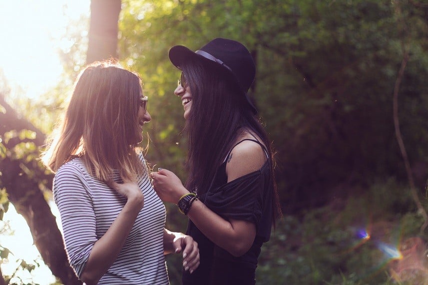 young girfriends giggling outdoor young girfriends giggling outdoor