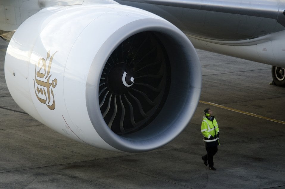 Airline safety engineer inspects a plane