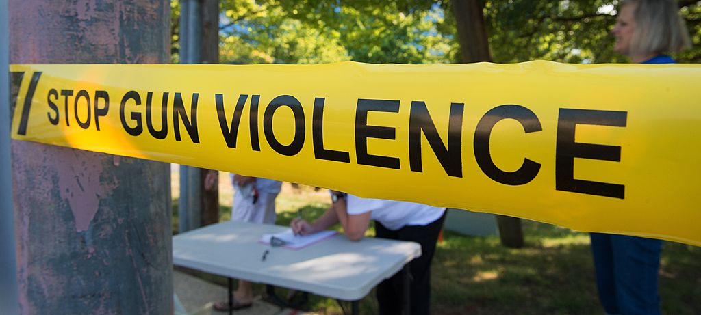 sign that says "stop gun violence"