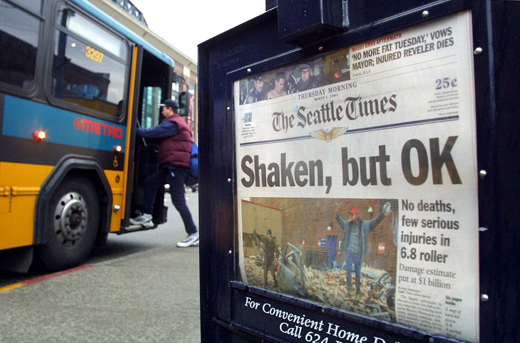 A 2001 Seattle newspaper headline saying "shaken, but OK"