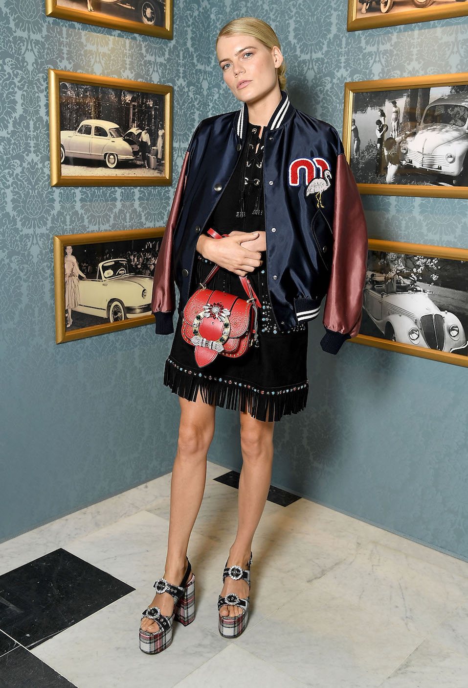 Emma Greenwell attends Miu Miu Cruise Collection show