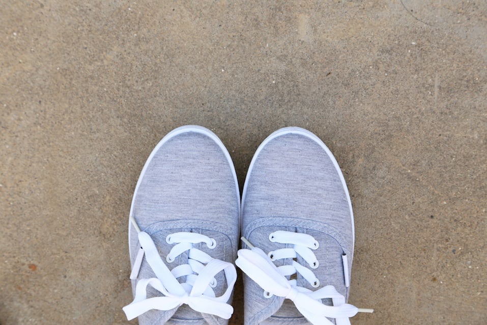Pair of grey shoes outdoors