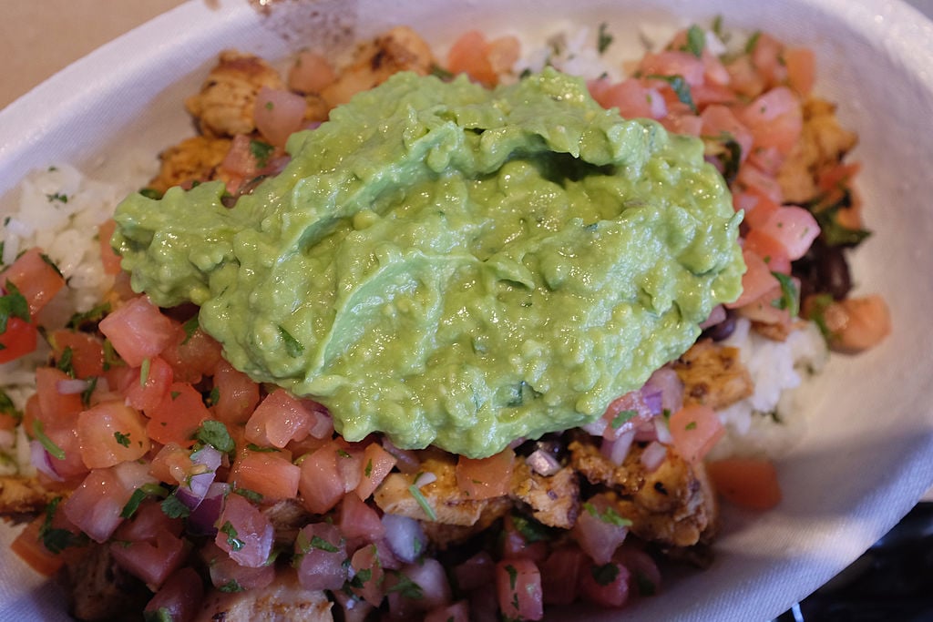 Guacamole sits on a dish at a Chipotle restaurant