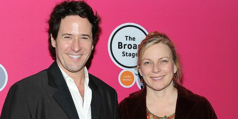 Rob Morrow and Debbon Ayer pose together on the red carpet.