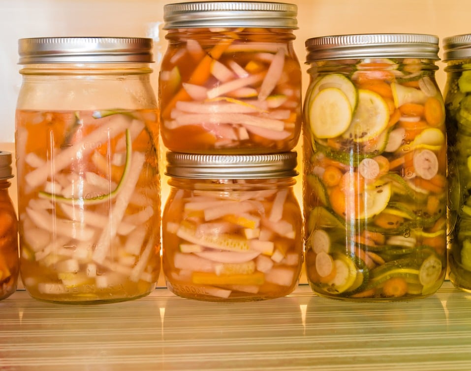 Sliced vegetables being pickled