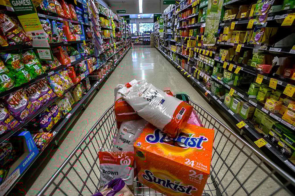 Products containing high sugar levels are on display at a supermarket