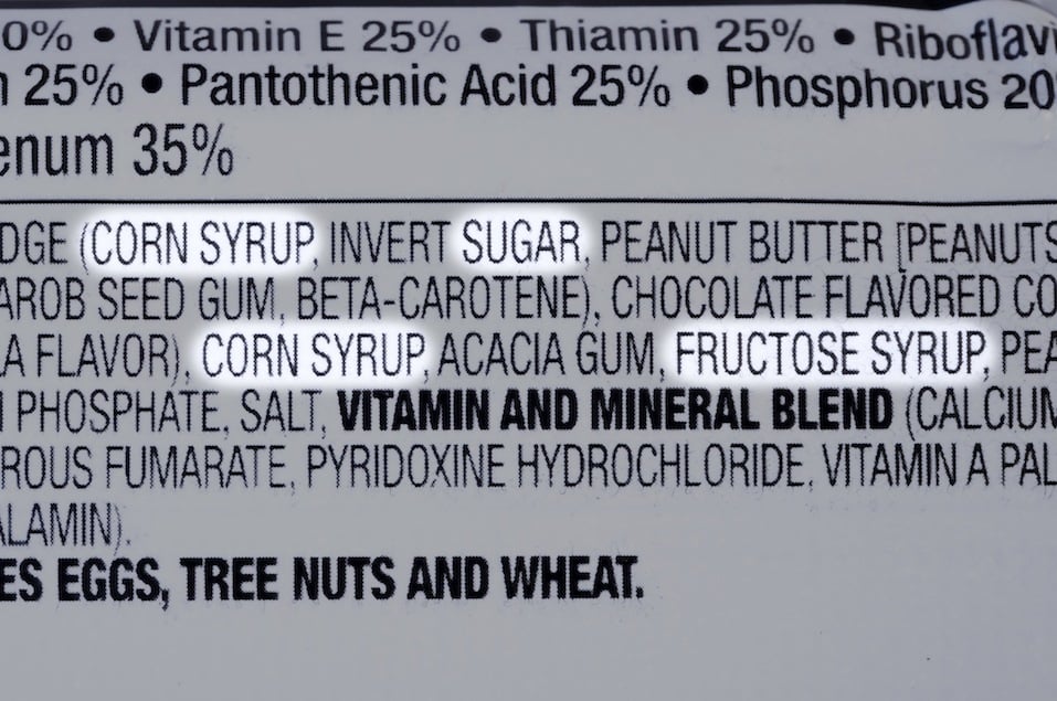 ingredients list of granola health bar with forms of sugar highlighted