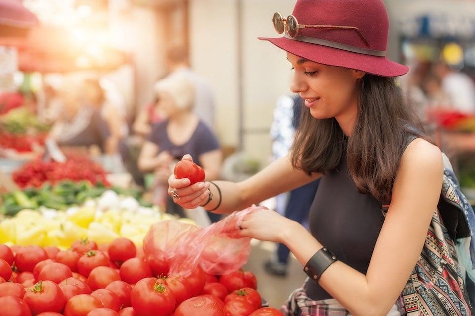 Woman at the fruit and vegetable market Woman at the fruit and vegetable market