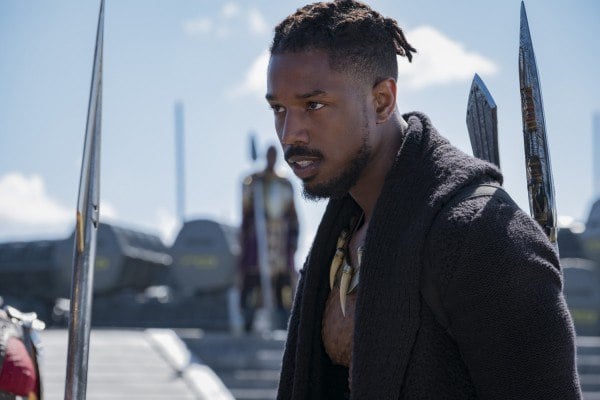 Killmonger wearing a black sweater while outside. Killmonger wearing a black sweater while outside.