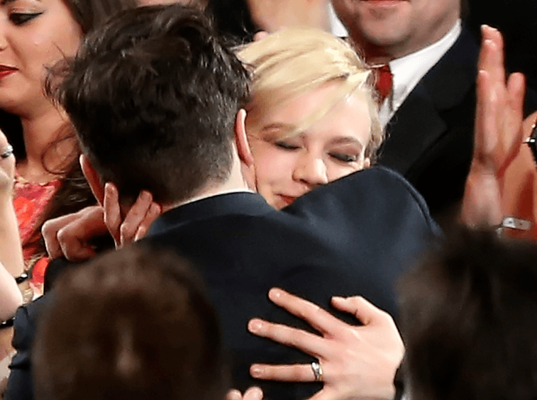 Carey Mulligan and Marcus Mumford share a hug at the 55th Annual Grammy Awards