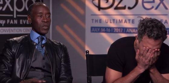 Mark Ruffalo puts his face in his hands while sitting next Don Cheadle on Good Morning America.