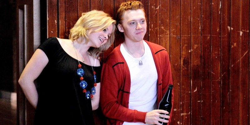 A woman leans against Rupert Grint in Cherrybomb. A woman leans against Rupert Grint in Cherrybomb.