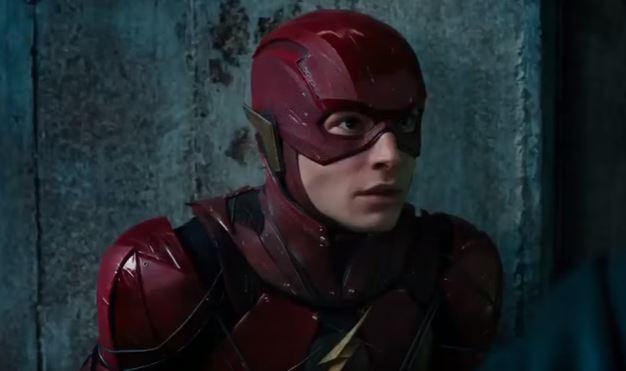 The Flash stares ahead while wearing his red suit The Flash stares ahead while wearing his red suit