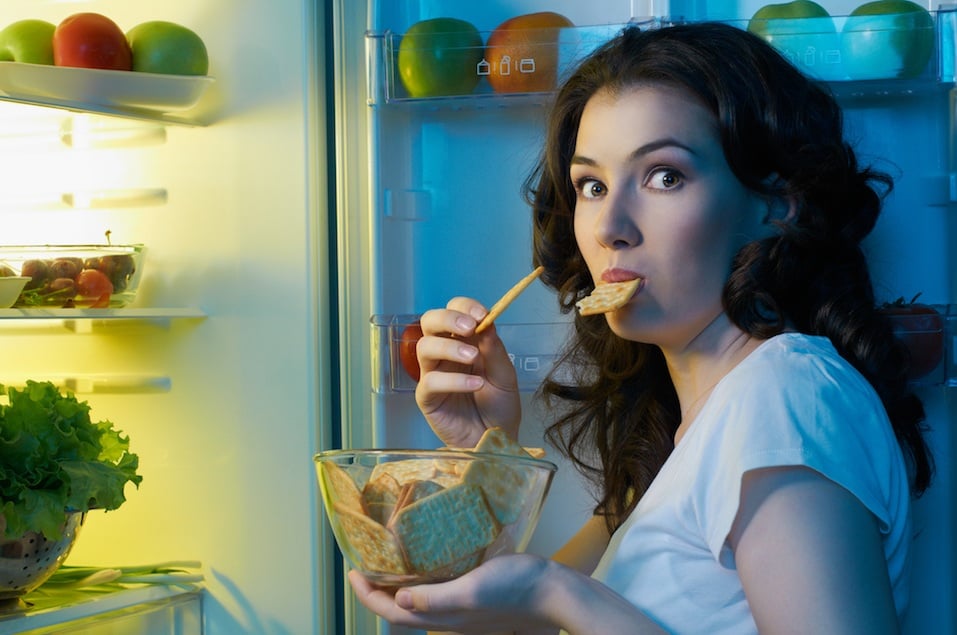 Girl opens the fridge with food Girl opens the fridge with food