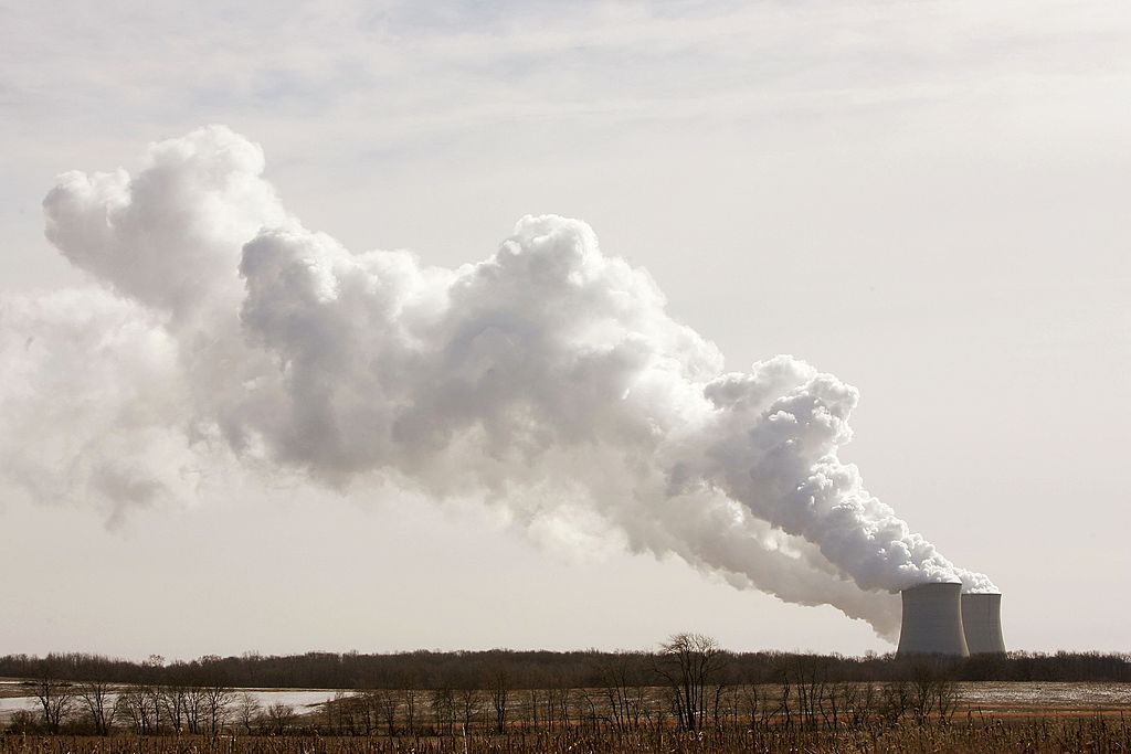 Steam billows from the cooling towers at an Illinois nuclear power plant