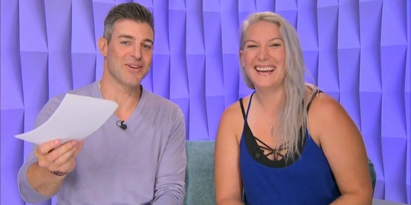 Megan Lowder talks to a man in the diary room of Big Brother.