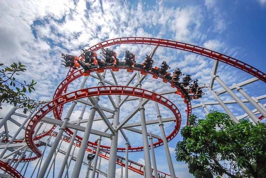 Dreamworld amusement park with roller coaster