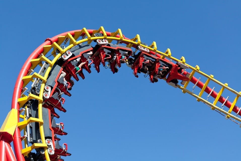 rollercoaster against blue sky