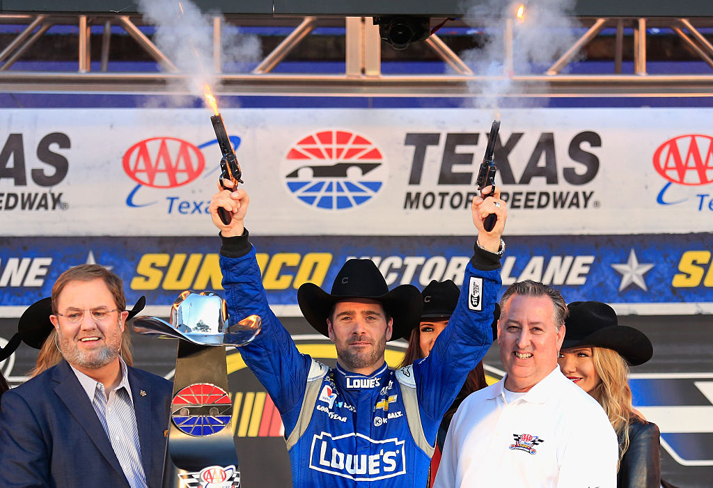 Jimmie Johnson shoots smoking pistols in the air