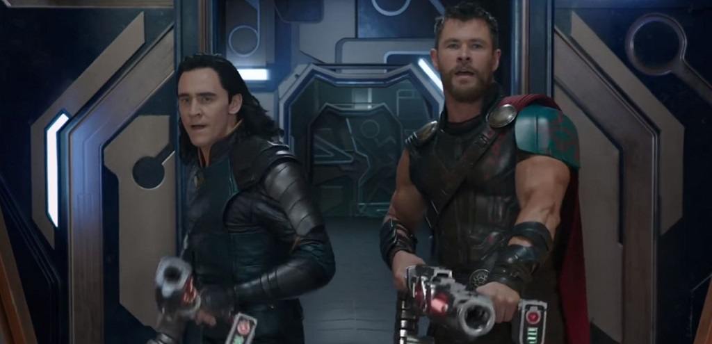 Loki and Thor aim laser guns in Thor: Ragnarok
