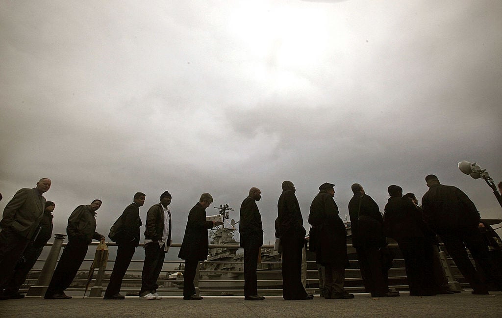 Applicants lined up for a job fair