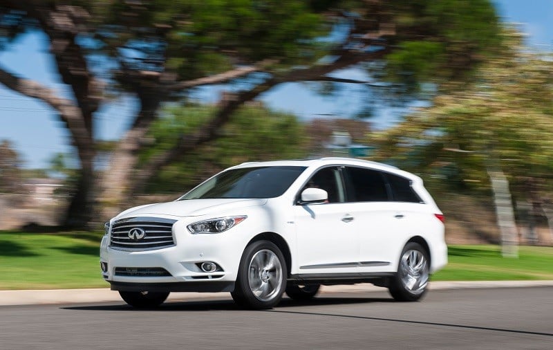 Road shot of white 214 Infiniti QX60 Hybrid
