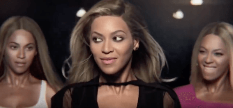 Beyonce stands with her music video personas in the Pepsi commercial.