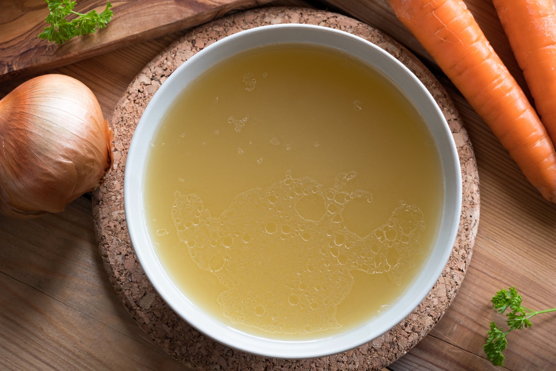 Bone broth made from chicken with vegetables Bone broth made from chicken with vegetables
