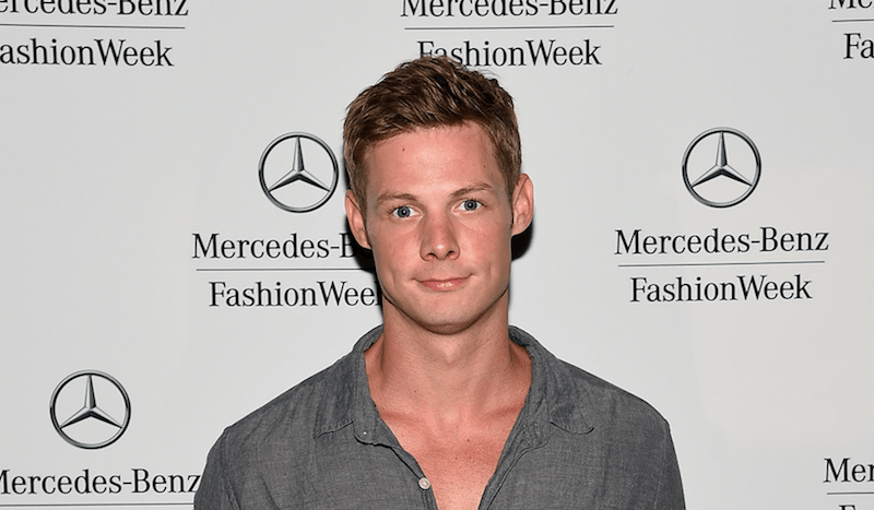 Brandon Jones poses for photos during New York Fashion Week.